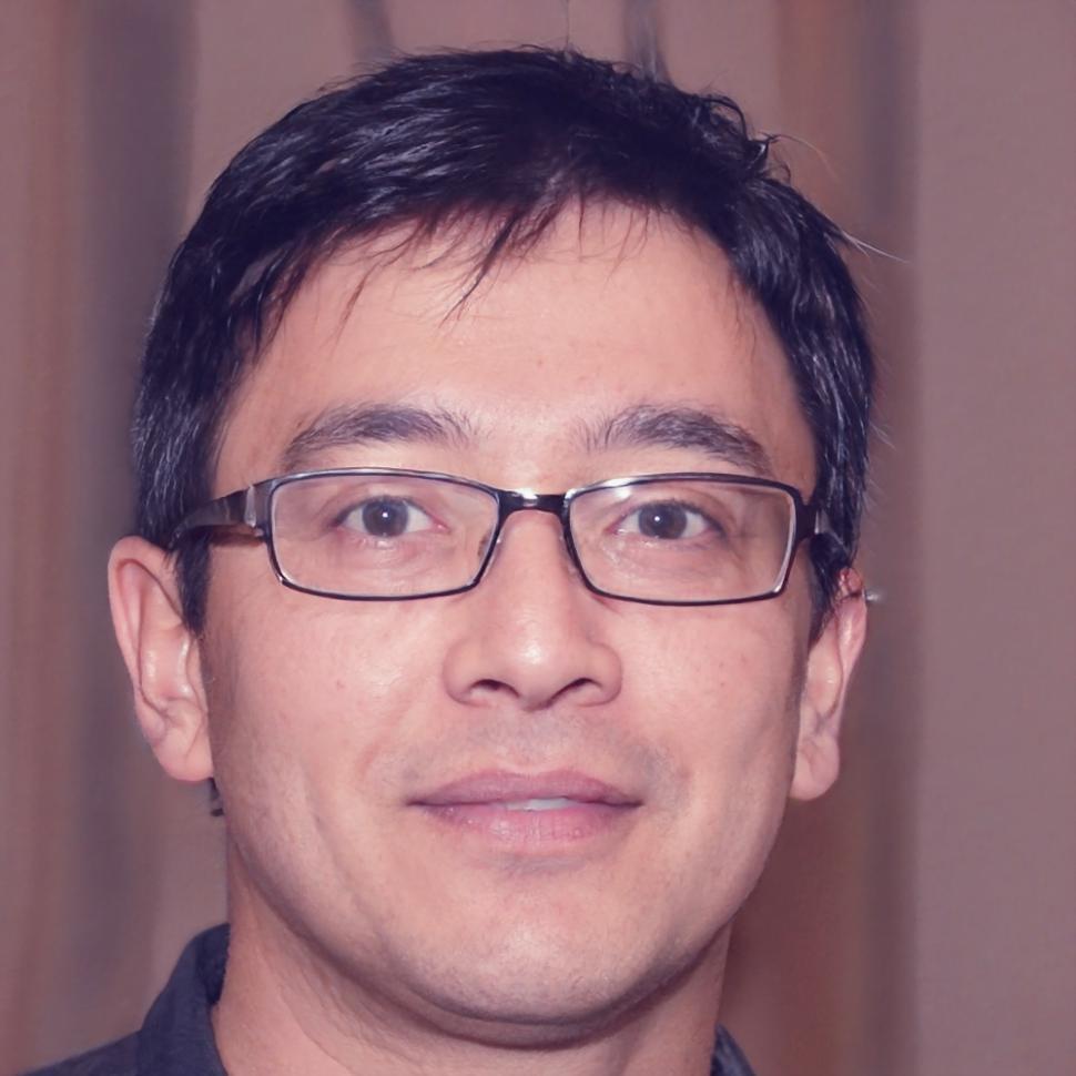 Instructor Henrik Nordström reviewing audio project with student